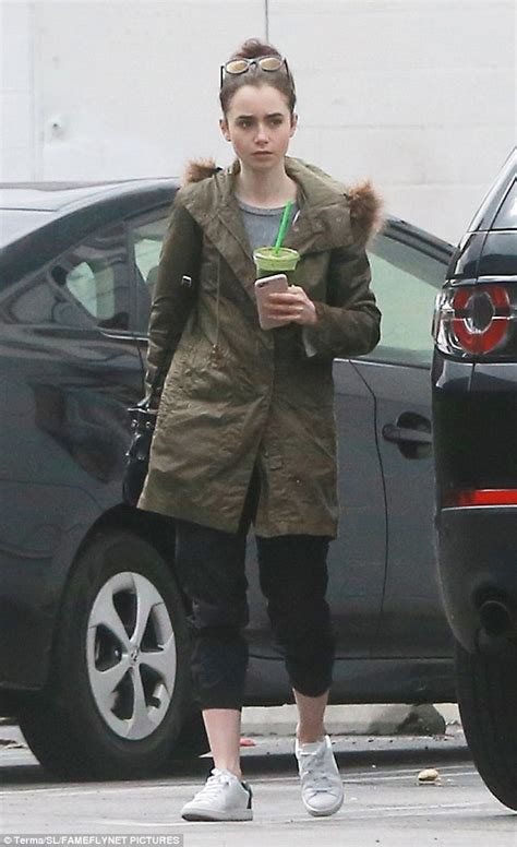 Lily Collins Lights Up Rainy Weekend With Makeup Free Face Daily Mail