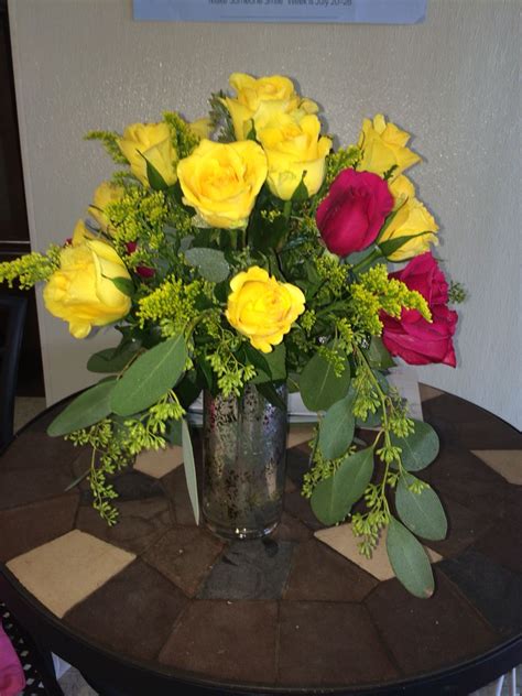 Austin's premier custom home builder. Dozen of Roses with Crackle Vase. Seeded Euc | Floral ...