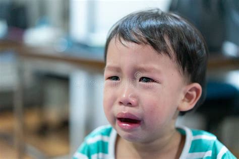A Sad Boy Is Crying He Doesn T Want To Go To Bed At Night Stock Image