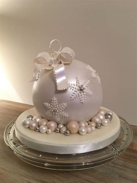 On the surface it looks smooth, slick, and solid, but the consistency of fondant is actually quite thin and the sugary paste is very liable to tearing while you're working with it. Fondant Christmas Bauble Cake by my wife | Christmas cake ...