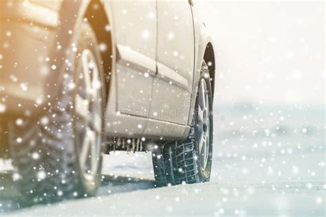 Close Up Of Car Wheels Rubber Tires In Deep Winter Snow Transportation