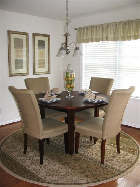 Neutral Transitional Dining Room With Round Table And Area Rug Hgtv