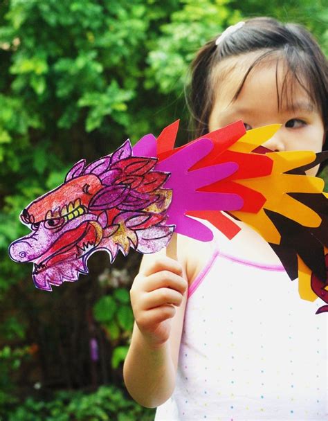 Chinese New Year Craft Handprint Dragon Puppet In 2020 Chinese New