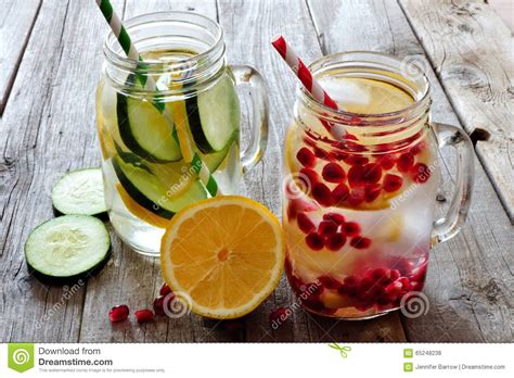 Checkout our wide variety of personalized water glasses with premium quality. Detox Water In Mason Jar Glasses Against Rustic Wood Stock ...