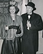 Myrna Loy and husband Gene Markey attend the Hollywood premiere of ...