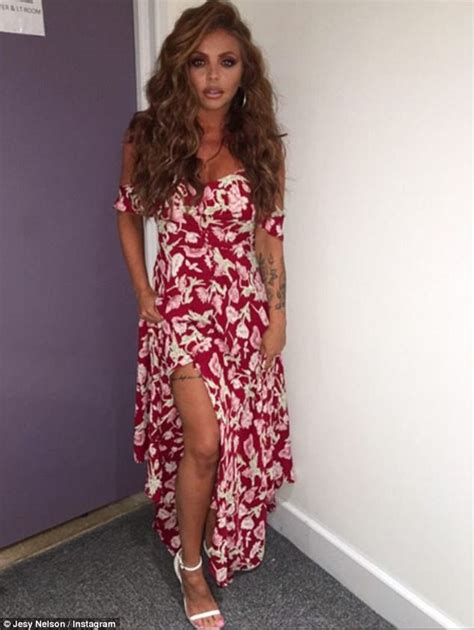 Jesy Nelson Flaunts Tattooed Pins In Red Hot Floral Dress Daily Mail Online