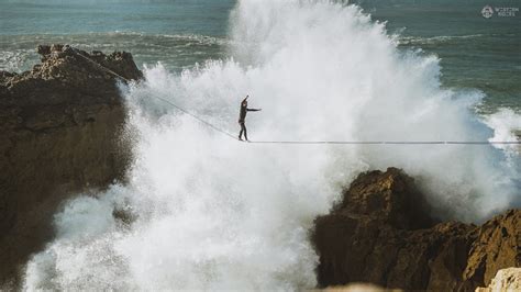 Daredevils Spine Chilling Tightrope Stunt Above Violent Waves Hits