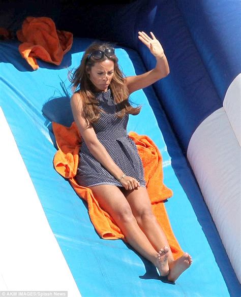 Rochelle Humes Flashes Her Underwear As She Climbs Up Slide In Tiny Dress Daily Mail Online