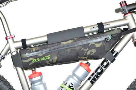 Adults get a 1/2 peck bag and children get a 1/4 peck bag. 1/2 Pack™ Frame Bag - Oveja Negra™
