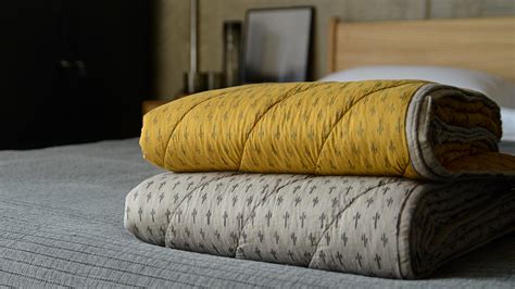 Reversible Quilted Throws Grey Or Turmeric Natural Bed Company