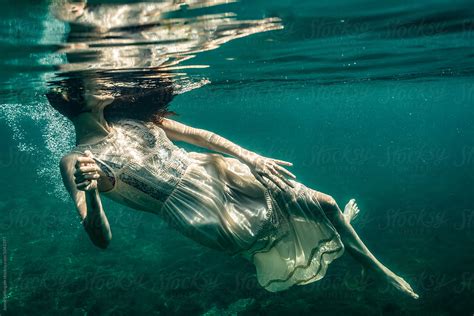 Underwater Photo Of Beautiful Woman Swimming In Boho Dress By Jenny Sathngam Underwater