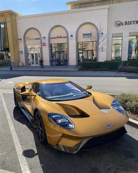 Ford Gt Painted In Golden Yellow Metallic W A Set Of Carbon Fiber