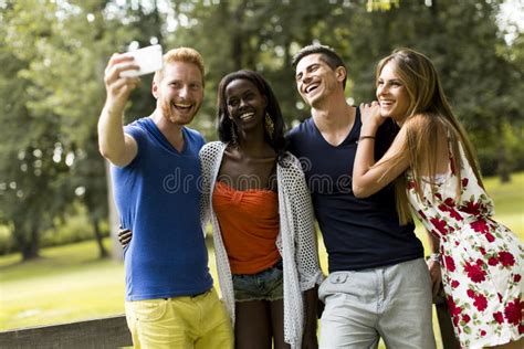 Young Multiracial Friends Taking Selfie In The Park Stock Image Image Of Friends Adults 67282873