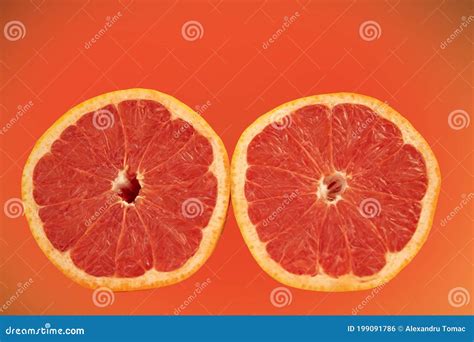 Two Halves Of Grapefruit In The Background Stock Photo Image Of Ripe