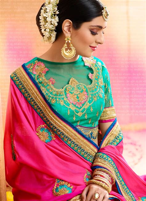 Artists and designers have found inspiration in its rich and vibrant beauty so there are actually quite a few. Buy Peacock blue and Firozi color silk wedding saree in UK ...