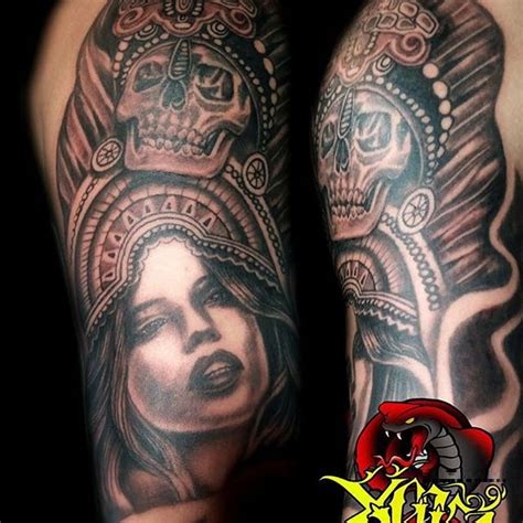 Superb Aztec Girl And Skull Face Tattoo On Right Arm Gp