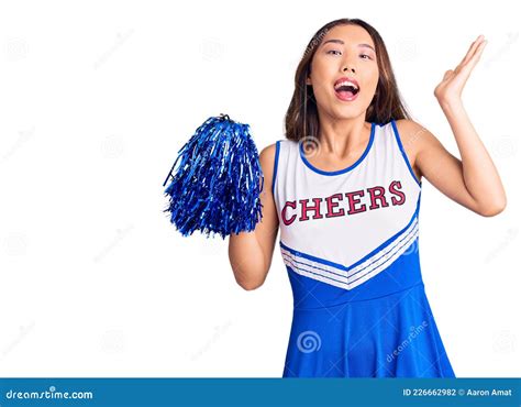 Young Beautiful Chinese Girl Wearing Cheerleader Uniform Holding Pompom