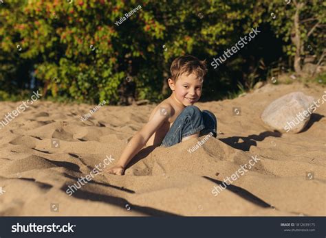 Cute Little Boy Digging Sand On Stock Photo 1812639175 Shutterstock
