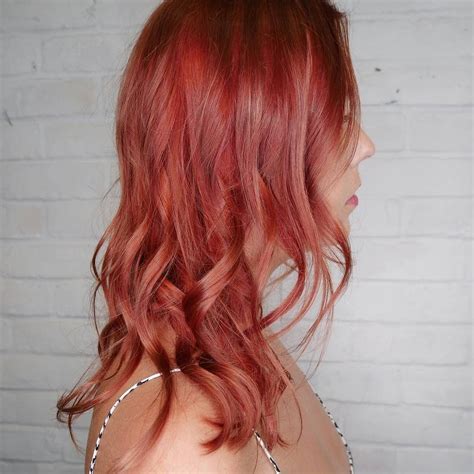 Bold Tones Of Red Pink And Copper Collide To Create A Burst Of Style