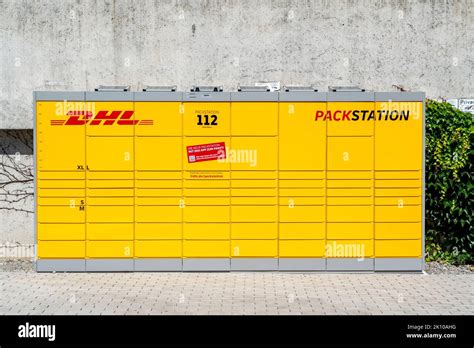 DHL Packstation, pick up and drop off DHL parcels Stock Photo - Alamy