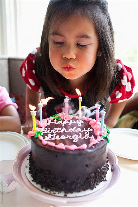 Blow Out Candles By Stocksy Contributor Jill Chen Stocksy