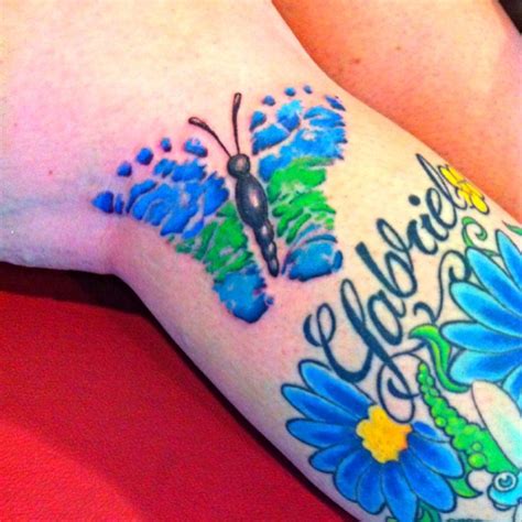 They represent hope, positivism, and beauty. baby footprint butterfly tattoo | tattoo ideas | Pinterest ...