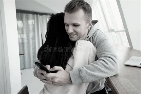 Man Texting Other Women When Embracing His Girlfriend Cheating Concept