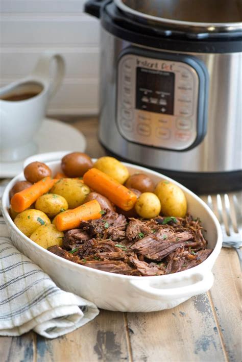 Roasted beefsteaks and potatoes with carrot. Instant Pot Pot Roast with Carrots and Potatoes | Valerie ...