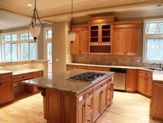 When you choose paint colors for your kitchen, you want to coordinate them with your wood cabinets. light wood floor with medium cabinets | {home is where the ...