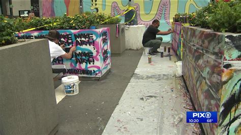 Artists Create Murals Outside World Trade Center