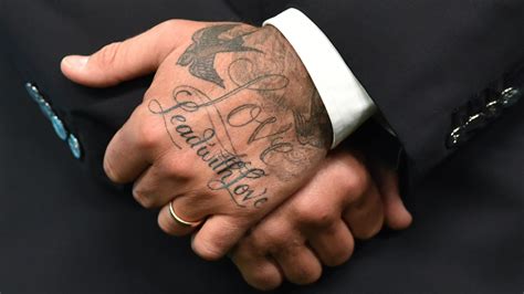 david beckham s tattoos where are they and what do they mean
