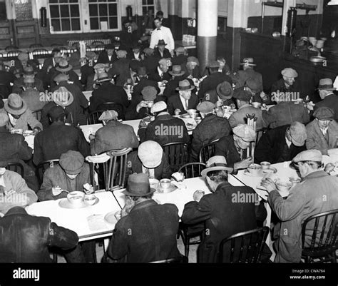 Great Depression Unemployed And Homeless Men Eating At Municipal