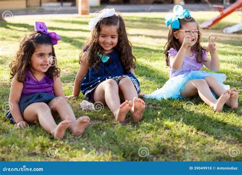 Wiggling Their Toes And Having Fun Stock Photo Image Of Cute Cousins