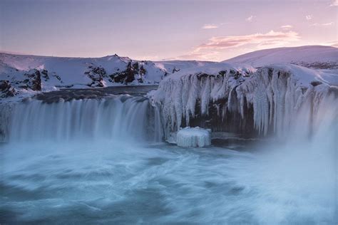 The Frozen Falls Of Godafoss Waterfall Of The Gods Iceland Winter