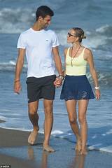 Novak djokovic is a serbian professional tennis player. Tennis ace Novak Djokovic plants a sweet kiss on wife Jelena during romantic stroll on the beach ...