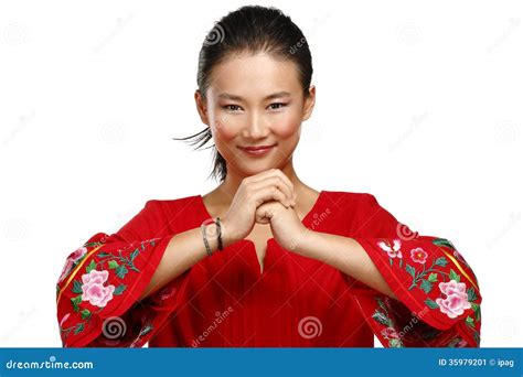 Het Chinese Gebaar Van De Vrouwengroet In Elegante Rode Kleding Stock