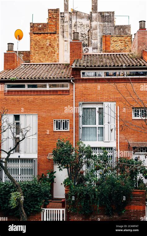 A Typical Brick Apartment Building In Barcelona Stock Photo Alamy