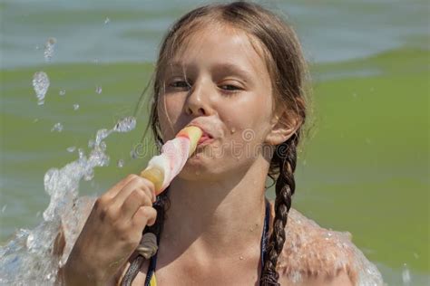 Girl Eating Ice Cream On The Beach Stock Image Image Of Food Blue