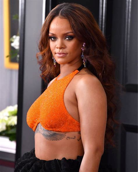Rihanna Shows Off Her Rib Tattoo At The Grammys