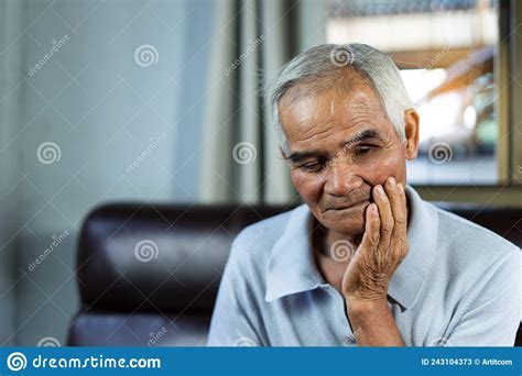 Asian Senior Man Patients Toothache While Hands On Cheek Health