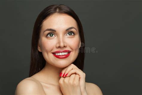 Cute Model Woman Brunette With Makeup And Red Manicured Nails Smiling