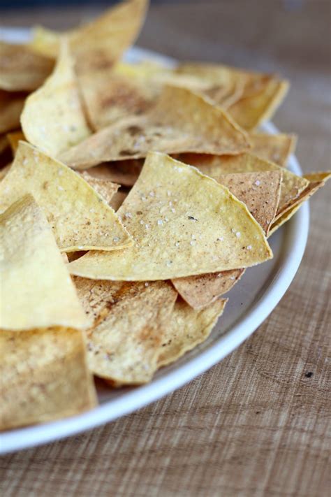 Place on a cookie sheet covered with a silpat* and lightly spray each chip with water. Homemade Oil Free Baked Tortilla Chips | The Conscientious ...