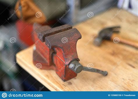 Red Vise On Work Bench With Hammer Stock Photo Image Of Construction