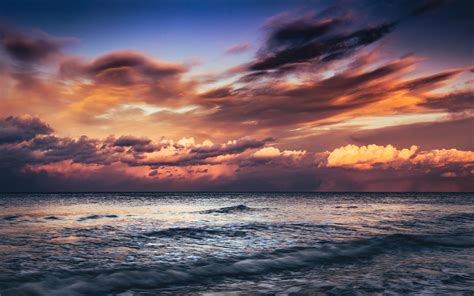Download Wallpaper 2560x1600 Sea Sunset Waves Clouds Dusk