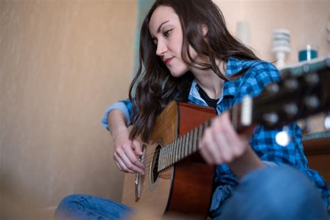 Premium Photo Young Girl Playing Acoustic Guitar