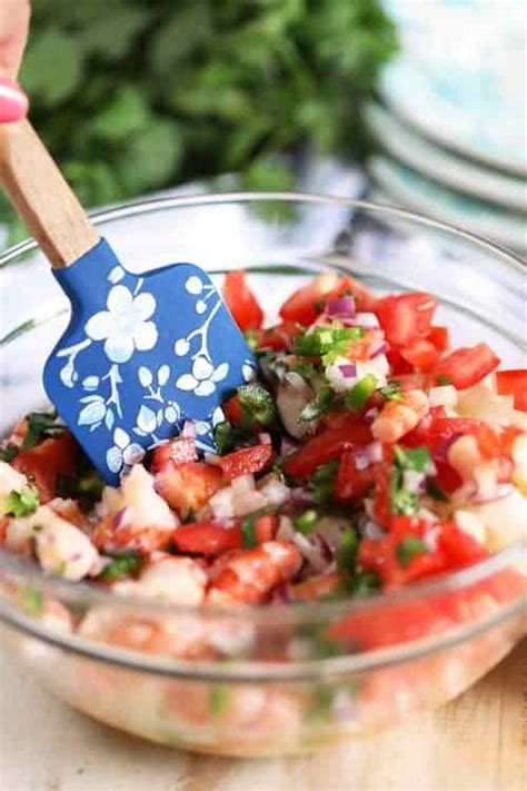 A classic ceviche uses fish or shrimp that has been marinated then combined with fresh tomatoes, cilantro, and lime. Easy Shrimp Ceviche Recipe {So Fresh!} - Spend With Pennies