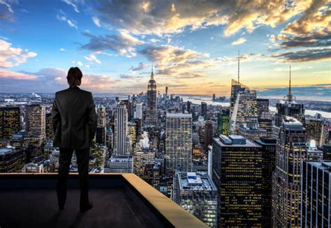 Man On Top Of Building Stock Photos Pictures And Royalty Free Images