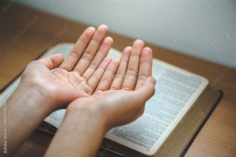 Hand Prayer On A Holy Bible In Church Concept For Faith Spirituality