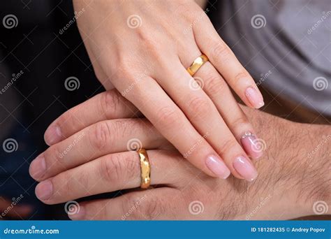 Couple`s Hand Showing There Wedding Rings Stock Image Image Of Relationship Fingernail 181282435