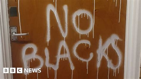 Arrest Over Racist Graffiti At Salford Flats Bbc News